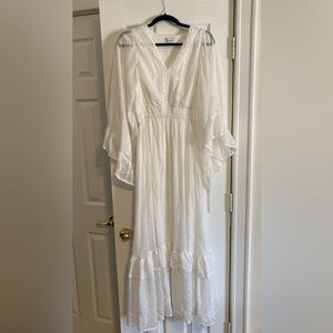 Long sleeve white dress. Perfect for a bride to be!